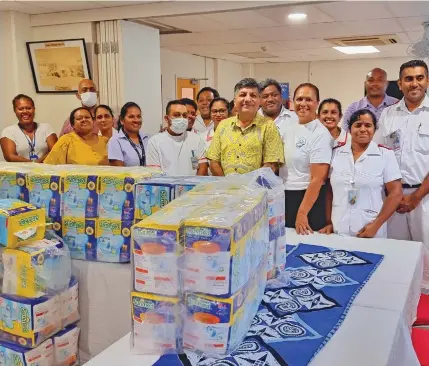  ?? Photo: Sampras Anand ?? Minister for Sugar and Multi Ethnic Affairs, Charan Jeath Singh handovers adult diaper packs to staff at Labasa Divisional Hospital on January 12, 2023.