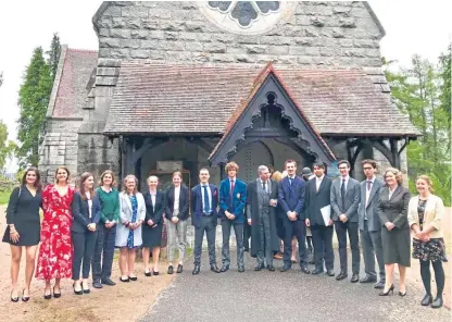  ??  ?? “Such a big stage”: Pupils, former pupils and staff from St Andrews School at Crathie Kirk.