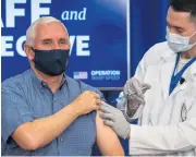  ??  ?? Shot in the arm: Mike Pence gets the vaccine