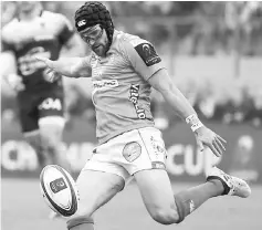  ??  ?? This file photo taken on Oct 21 shows Benetton Treviso’s Irish fullback Ian McKinley kicking the ball during the European Rugby Champions Cup match against RC Toulon at the Monigo stadium in Treviso. — AFP photo