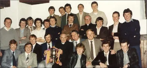  ?? Photograph: George Hatchell. ?? The Faythe Harriers celebratio­ns after their Senior hurling final victory in 1981. Back (from left): Marty O’Connor, Myles O’Connor, Ned Buggy, Seamus O’Connor, Tony ‘Sack’ Walsh. Middle (from left): George O’Connor (R.I.P.), Nicky Keeling, Con Dowdall, Billy Walsh, Tommy Hynes, Jimmy Goodison, Brendan Murphy, Fr. Hugh O’Byrne (R.I.P.), Brendan Browne (R.I.P.), Billy Keeling, Paud Browne. Front (from left): Eddie ‘Heffo’ Walsh, Liam Bennett (R.I.P.), Willie Carley, John ‘Stella’ Walker (R.I.P.), Bishop Donal Herlihy (R.I.P.), Mayor of Wexford Noel Murphy (R.I.P.), Nicky Murphy, Willie Murphy, Paddy O’Gorman, Joe Keeling.