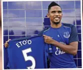  ??  ?? Back in blue: Eto’o poses with his new No 5 shirt