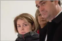  ?? The Canadian Press ?? Liberal MP Sherry Romanado is flanked by colleagues as she leaves a committee meeting, in Ottawa on Monday.