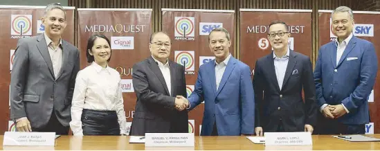  ?? ?? Making the MediaQuest and ABS-CBN deal official are (from left) Smart & PLDT president & CEO Alfredo Panlilio, MediaQuest Holdings president & CEO Jane Basas, MediaQuest Holdings chairman Manuel V. Pangilinan, ABS-CBN chairman Mark Lopez, ABS-CBN president & CEO Carlo Katigbak, and ABS-CBN chief partnershi­p officer Bobby Barreiro.