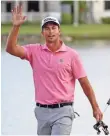  ?? PETER CASEY, USA TODAY SPORTS ?? Adam Scott waves to the crowd after clinching his win.