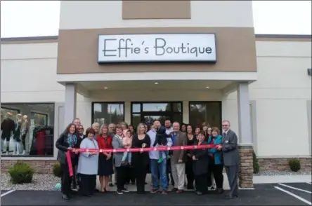  ?? PHOTOS BY LAUREN HALLIGAN — DIGITAL FIRST MEDIA ?? A crowd of friends, family and supporters gather for a grand opening and ribbon-cutting ceremony for Effie’s Boutique in Halfmoon.