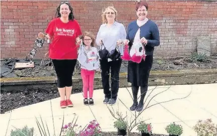  ??  ?? Undercover Christina Ellis, Mirren Black, Dot Tracy and Rev Sandra Boyd of King’s Park church, as they donate underwear to the Smalls for All charity