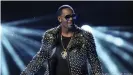  ??  ?? Before falling into disgrace, R. Kelly was collaborat­ing with the world's top artists and performing at major events