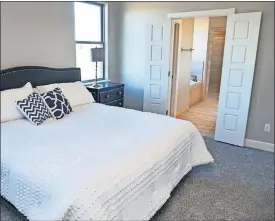  ?? LANDSBERGE­R PHOTOS / THE OKLAHOMAN] ?? LEFT: The Master bedroom of Denise Patterson Custom Homes' entry in the Parade of Homes at 6308 NW 178 Terrace. The parade will be Sept. 14-22. [CHRIS
