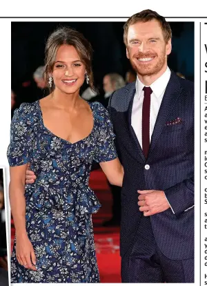  ??  ?? Part: Michael Fassbender with wife Alicia Vikander. Left: Pitt