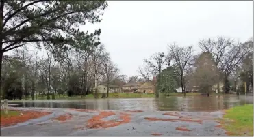  ?? kevin Myrick ?? Big Spring Park was overflowed from spring water cut off from it’s exit into Cedar Creek during flooding in Cedartown on Feb. 6.