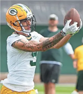  ?? MARK HOFFMAN / JOURNAL SENTINEL ?? Christian Watson and other Packers rookie receivers recently had three new phases of the playbook introduced to them.