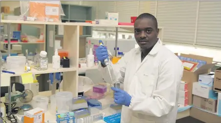  ??  ?? MILESTONE: Agricultur­e Victoria research scientist Solomon Maina works towards an Australian-first method to improve plant-virus detection.