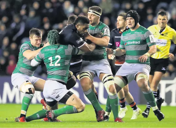  ?? IAN MACNICOL ?? ■ Pedro Bettencour­t of Newcastle Falcons tackles Bill Mata of Edinburgh Rugby in the Champions Cup and left, Falcons’ Chris Harris