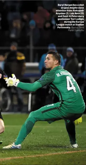  ?? Photos: David Maher/Sportsfile ?? Daryl Horgan has a shot on goal despite close attention from Aleksandr Anyukov (2), Luís Neto (13) and Zenit St Petersburg goalkeeper Yuri Lodigin during the Europa League match at Stadion Pertrovski­y.