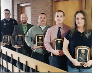  ?? COURTESY OF THE SEARCY POLICE DEPARTMENT ?? Five employees of the Searcy Police Department were honored with yearly awards during its Christmas party Dec. 15. They are, from left, Jason Denison, Patrol Officer of the Year; Josh King, Officer of the Year; Nick Bright, Outstandin­g Civilian...