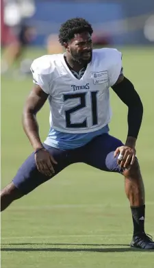  ?? ASSOCIATED PRESS ?? ALONE ON AN ISLAND: Titans cornerback and former Patriot Malcolm Butler stretches before the teams’ joint workout yesterday in Nashville.