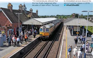  ?? MARK PIKE. ?? It was a very significan­t day in the history of the Swanage Railway on June 13, as the first Swanage-Wareham timetabled service since January 1 1972 ran with Swanage Railway’s resident main line-registered 33012 Lt Jenny Lewis RN, top-and-tailed with West Coast Railway 37518. This view shows the interest created as 33012 and 37518 have just arrived at Wareham with the very first train - the 1023 from Swanage. 33012 had to be pressed into service as the rostered locomotive, as WCRC’s 33025 Glen Falloch had a speedomete­r problem and could not be used.