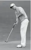  ?? Jeff Gross/getty Images ?? Canada’s David Hearn putts on the third hole during the second round of The Barclays on Friday.