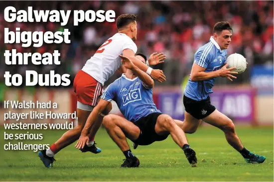  ??  ?? Dublin’s Brian Howard, making a break as James McCarthy is knocked over by Tyrone’s Michael McKernan last weekend, would be a significan­t addition to Galway