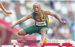  ?? Gallo Images ?? Sokwakhana Zazini of South Africa finished third in his heat of the men’s 400m hurdles in Tokyo. /