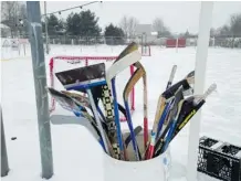  ??  ?? At Calahan Park in Burlington, visitors can bring their own skates and grab a hockey stick from the “borrow barrel.”