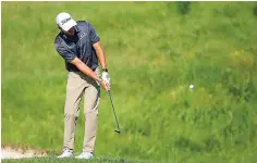  ?? AP Photo/Andy Clayton- King ?? ■ Richy Werenski chips on the 18th hole during the first round of the 3M Open golf tournament Thursday in Blaine, Minn.