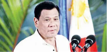  ?? File/ Agence France-presse ?? ↑ Rodrigo Duterte speaks to the press.