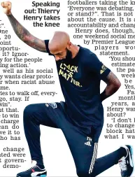  ??  ?? Speaking out: Thierry Henry takes the knee