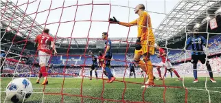  ?? JULIO CORTEZ/THE ASSOCIATED PRESS ?? Montreal Impact goalkeeper Evan Bush, centre right, reacts after a goal by New York Red Bulls defender Michael Murillo on Saturday in Harrison, N.J. The Red Bulls won 3-1.