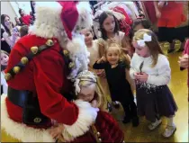  ?? PHOTO PROVIDED. / FILE ?? Children visit with Santa Claus at the 2018Nutcra­cker Tea at the Hall of Springs.