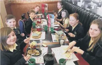  ??  ?? Hedworth Lane Primary School pupils dining at Frankie & Benny’s and, below, one of the entries for the Easter Egg Competitio­n.