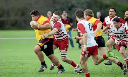  ?? LAWRENCE GULLERY/STUFF ?? Thames Valley prop Sitiveni Tupou attempts to shake off West Coast defenders.