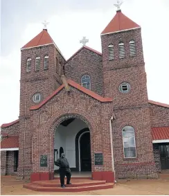  ??  ?? Mukonori outside his church at Chishawash­a Catholic Mission in Zimbabwe.