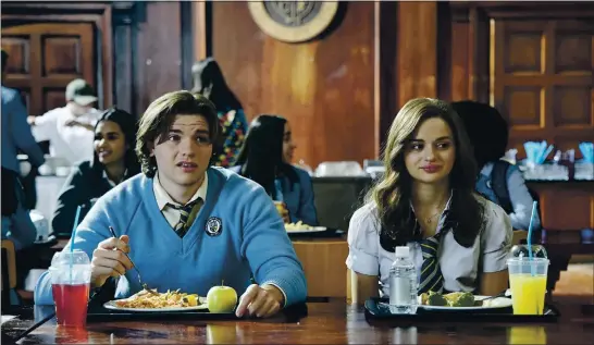  ?? NETFLIX ?? Joel Courtney, left, and Joey King return for the high school romantic comedy “The Kissing Booth 2.”