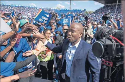  ?? Photos: Troy Enekvist, David Harrison and Rajesh Jantilal/AFP ?? Planned progressio­n: The election of Mmusi Maimane (above) as the leader of the Democratic Alliance marked a new phase in the growth of the party. Helen Zille (centre, left), now premier of the Western Cape, led the DA for eight years after taking over...