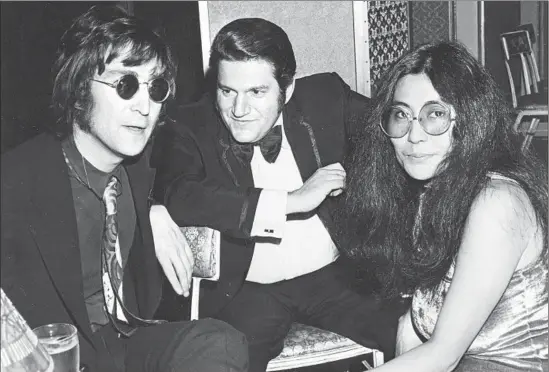  ?? Janet Goodman
ABKCO Archives / Houghton Miff lin Harcour t ?? ALLEN KLEIN, center, with John Lennon and Yoko Ono in 1972. Fred Goodman’s book offers a blow-by-blow account of the Beatles’ breakup.