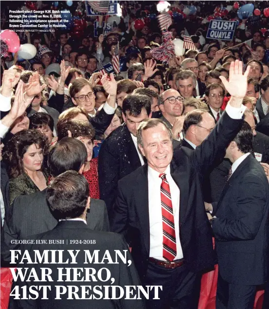  ?? MIKE SPAGUE/AFP/GETTY IMAGES FILES ?? President-elect George H.W. Bush wades through the crowd on Nov. 8, 1988, following his acceptance speech at the Brown Convention Center in Houston.