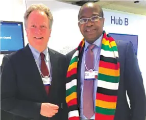  ??  ?? Finance and Economic Developmen­t Minister Mthuli Ncube poses for a picture with W orld Food Programme Executive Director David Beasley at the World Economic Forum in Davos, Switzerlan­d yesterday