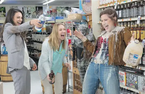  ?? MICHELE K. SHORT/STX PRODUCTION­S ?? Mila Kunis, left, Kristen Bell and Kathryn Hahn’s chemistry propels the comedy Bad Moms.