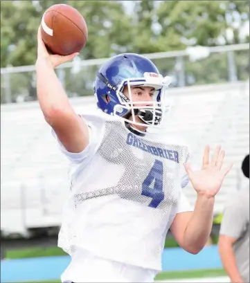  ?? PHOTOS BY WILLIAM HARVEY/RIVER VALLEY & OZARK EDITION ?? Greenbrier senior quarterbac­k Jeremy Kendall fires a pass during preseason drills.