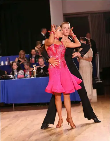  ?? Facebook photo submitted by Tresa Anderson ?? Landon Anderson and Janna Johnson perform at a ballroom dance competitio­n.