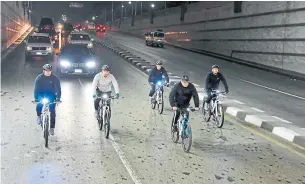  ?? THE ASSOCIATED PRESS ?? Egyptian President Abdel-Fattah el-Sissi rides his bike to the national Military Academy near Cairo.