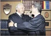  ?? NICK UT / ASSOCIATED PRESS 1989 ?? Judge Joseph A. Wapner (left), of TV’s “The People’s Court” congratula­tes his son, Judge Frederick N. Wapner, in 1989 after he became a Municipal Court judge in Los Angeles.