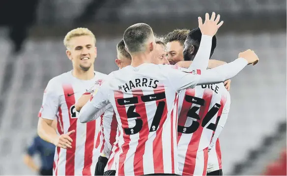  ?? ?? Sunderland celebrate Tyrese Dyce’s opening goal.