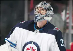  ?? BRUCE BENNETT/GETTY IMAGES ?? Connor Hellebuyck set an NHL record for wins by a U.S.-born goalie in a single season with 44, helping lead the Winnipeg Jets to the second-most points in the league this season.