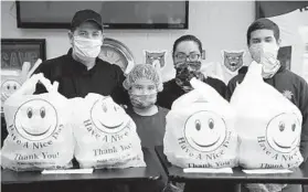  ?? STACEYWESC­OTT/CHICAGOTRI­BUNE ?? Pablo Sanchez, from left, Erika Sanchez, 10, Erika Castro and Pablo Sanchez, 15, at the family’s restaurant, Gyros Planet in Evanston, Illinois, on April 23.