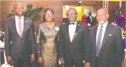  ??  ?? L - R: Temi Popoola, CEO, Nigerian Exchange Limited (NGX); Yemisi Edun, managing director, First City Monument Bank (FCMB) Limited;. Oluwole Adeosun, First vice president, Chartered Institute of Stockbroke­rs (CIS); Bola Ajomale, managing director/CEO, NASD Plc, at the investitur­e of. Olukayode Pitan as an honorary fellow of CIS, recently in Lagos.