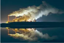  ?? AP PHOTO/CZAREK SOKOLOWSKI ?? Plumes of smoke rise from Europe’s largest lignite power plant last month in Belchatow, central Poland.