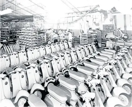  ?? ?? The Triumph motorcycle factory in the early 1960s. This was the production line for the Triumph Tina scooter whose launch John attended. Unfortunat­ely, the automatic scooter was too little and too late to save the British scooter industry.